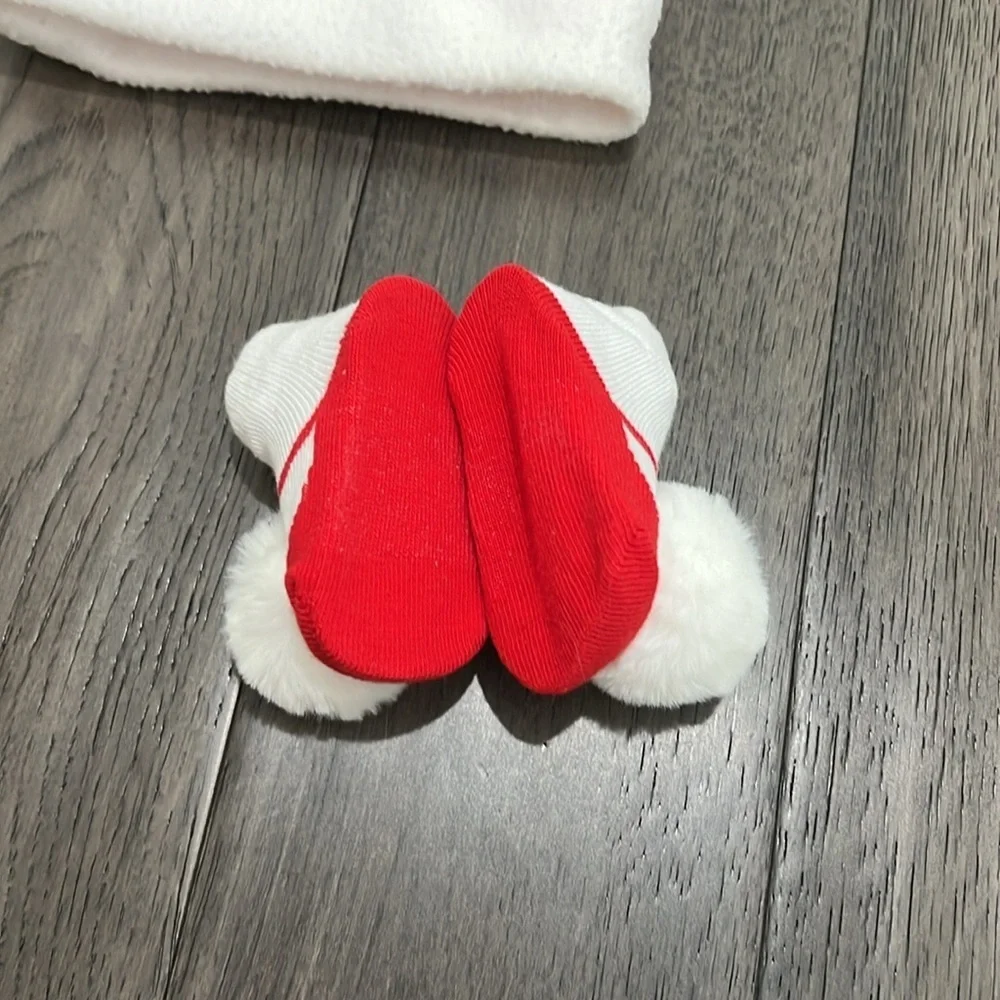 NWOT infant Santa hat with matching sock booties with pom-poms